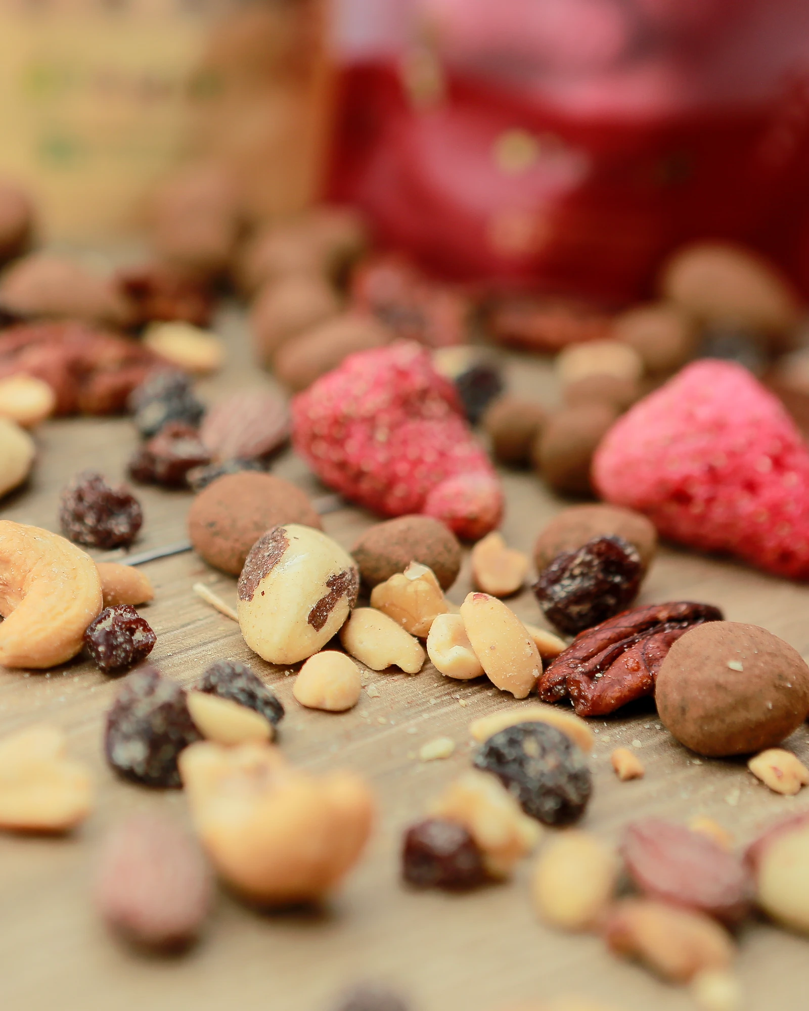 Texturas e sabores. Castanhas, frutas e chocolate. Fotografia Made in Natural.